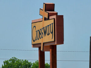 Crossway sign where an exit panic bar replacement was completed